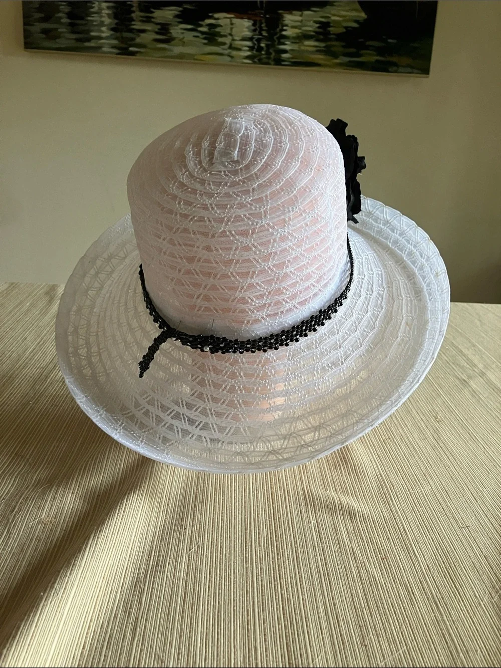 Elegant White Women's Dress Hat with Black Velvet Floral Accent